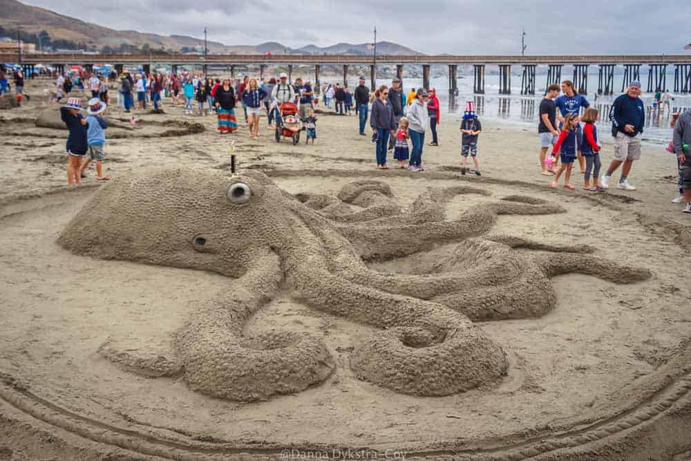 An octopus sand sculpture on the beach in Cayucos, CA