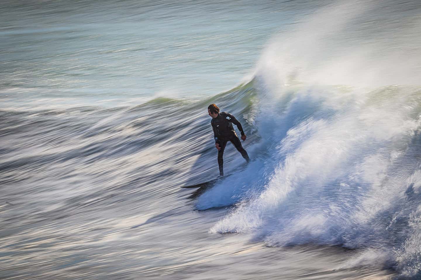 Surfer surfing a Big Swell