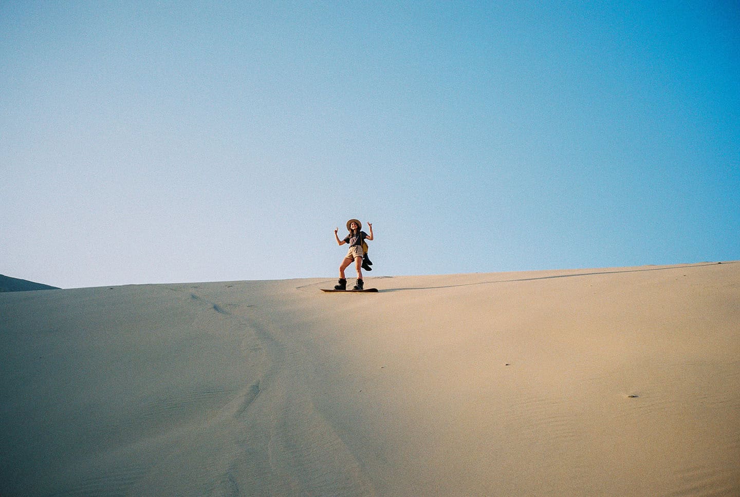 Woman Sandboarding