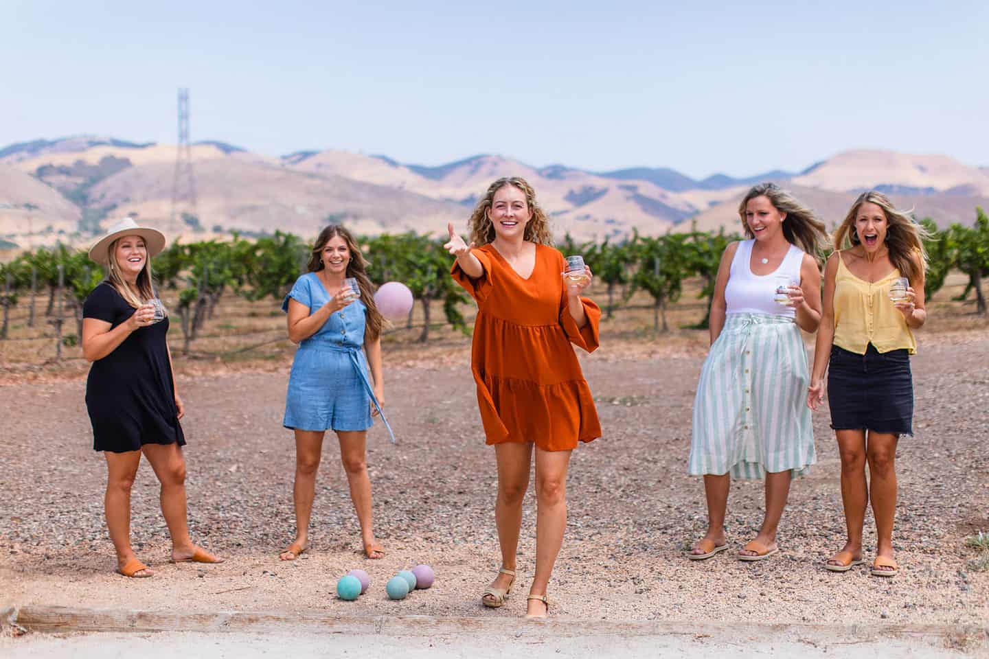 Women enjoying wine and bocce ball at Baileyana Winery